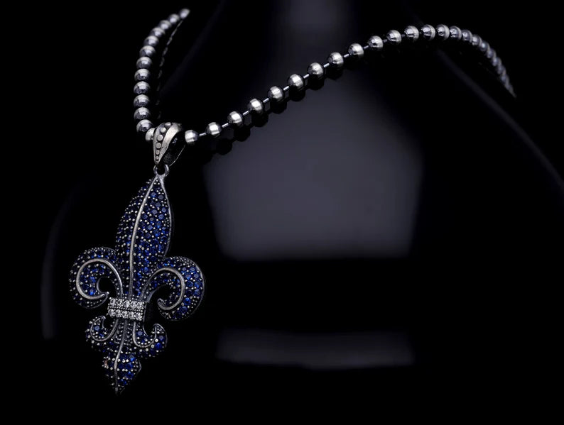 RARE PRINCE by CARAT SUTRA | Unique Designed Fleur-De-Lis Pendant Studded with Blue Zircons for Men | 925 Sterling Silver Oxidized Pendant | Men's Jewelry | With Certificate of Authenticity and 925 Hallmark