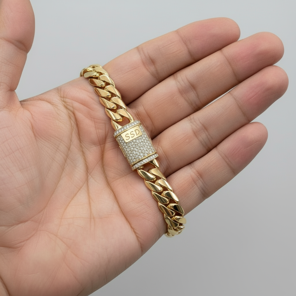 RARE PRINCE by CARAT SUTRA | Solid 12mm Miami Cuban Link Bracelet with Iced Lock | 22kt Gold Micron Plated on 925 Sterling Silver Bracelet with AAA+ Quality Swarovski Diamonds | Men's Jewelry | With Certificate of Authenticity and 925 Hallmark - caratsutra