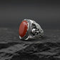 Skull designed Ring with Oval shaped 10ct Natural Red Coral (Moonga) | 925 Sterling Silver Oxidized Ring | With Certificate of Authenticity and 925 Hallmark - caratsutra