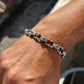 Infinity Style Hand-Engraved Bracelet with mini Natural Blue Sapphire (Neelam) Stone | 925 Sterling Silver Bracelet | With Certificate of Authenticity and 925 Hallmark - caratsutra