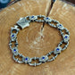 Infinity Style Hand-Engraved Bracelet with mini Natural Blue Sapphire (Neelam) Stone | 925 Sterling Silver Bracelet | With Certificate of Authenticity and 925 Hallmark - caratsutra