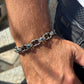Infinity Style Hand-Engraved Bracelet with mini Natural Blue Sapphire (Neelam) Stone | 925 Sterling Silver Bracelet | With Certificate of Authenticity and 925 Hallmark - caratsutra