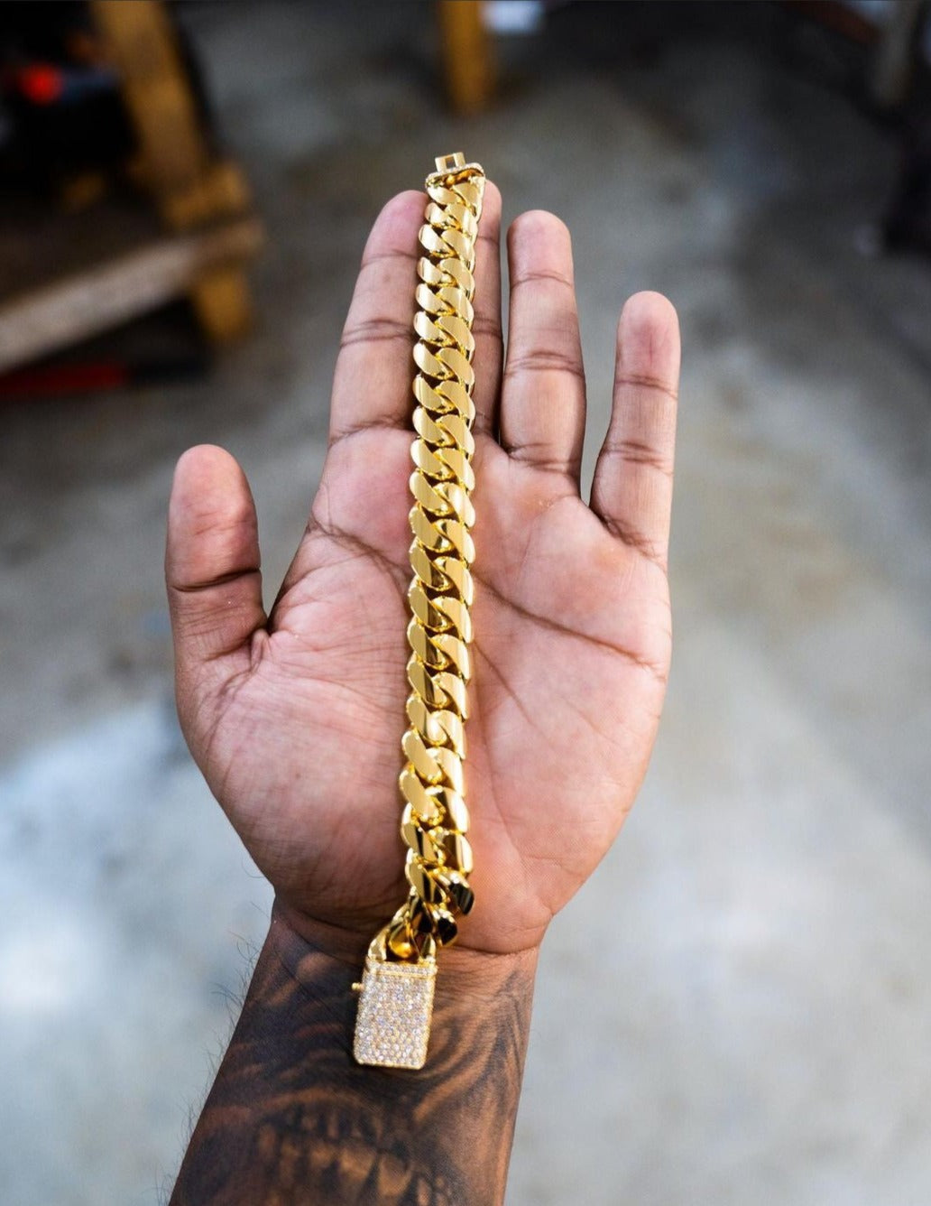 RARE PRINCE by CARAT SUTRA | Solid 10mm Miami Cuban Link Bracelet with Iced Lock | 22kt Gold Micron Plated on 925 Sterling Silver Bracelet with AAA+ Quality Swarovski Diamonds | Men's Jewelry | With Certificate of Authenticity and 925 Hallmark - caratsutra