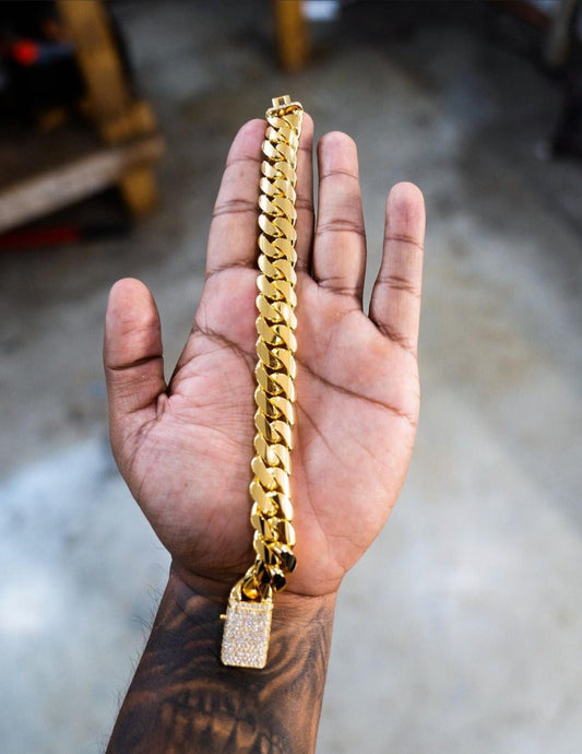 RARE PRINCE by CARAT SUTRA | Solid 12mm Miami Cuban Link Bracelet with Iced Lock | 22kt Gold Micron Plated on 925 Sterling Silver Bracelet with AAA+ Quality Swarovski Diamonds | Men's Jewelry | With Certificate of Authenticity and 925 Hallmark - caratsutra